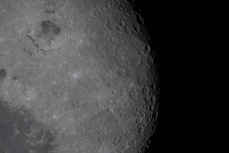 cratered lunar surface seen in shadowed relief